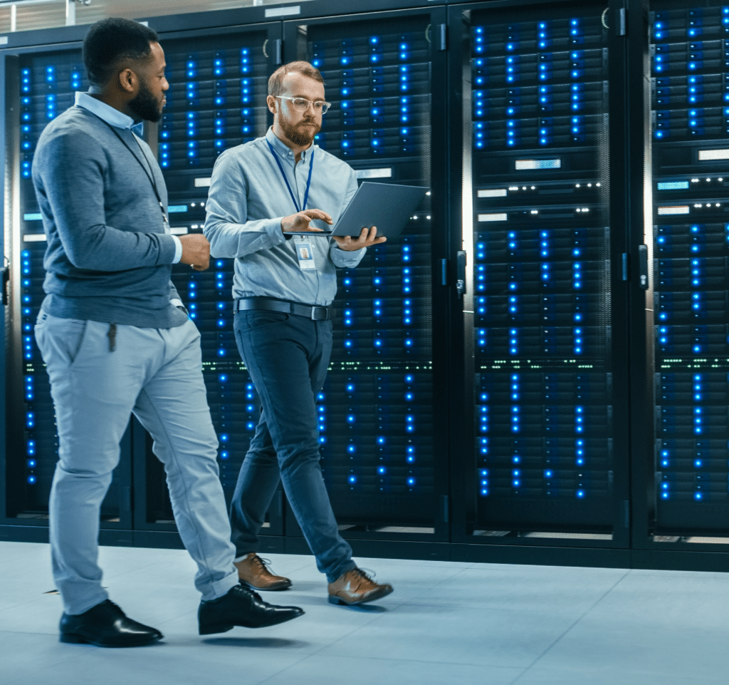 Men Walking in a Room With Secure Servers