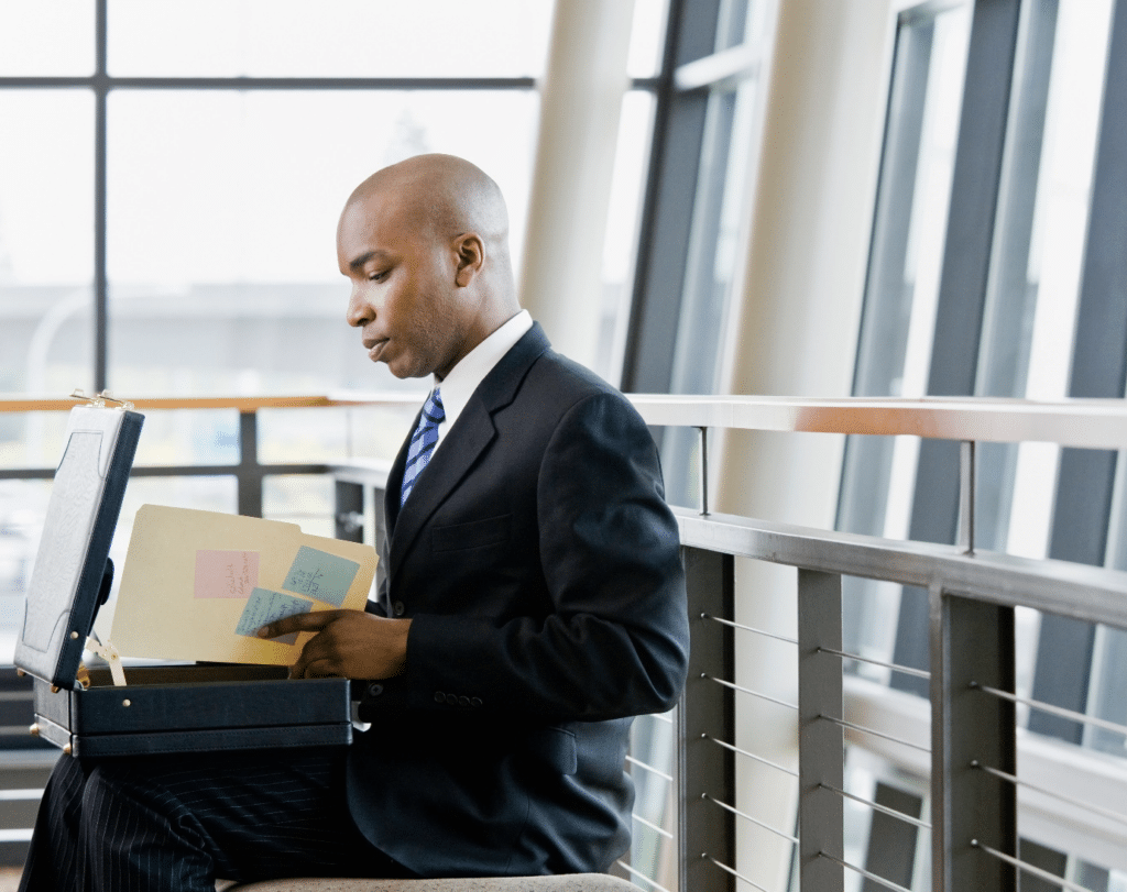 Business Man in a Suit Preparing for a Meeting